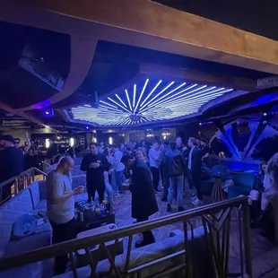 a crowd of people at a party