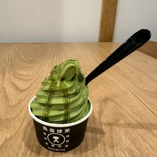 Matcha soft serve in a cup