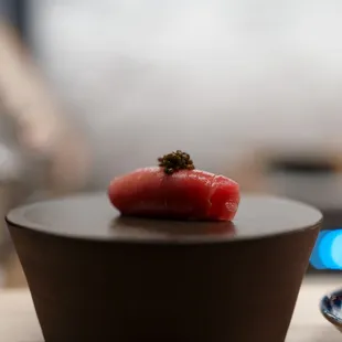 a sushi on a plate