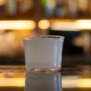 a shot of milk in a glass