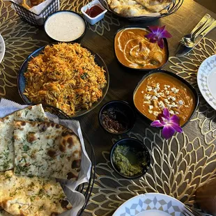 Garlic Naan, Butter Naan, Shrimp Biryani, Masala Fries, chutney, Butter Paneer Masala, Chicken Tikka Masala