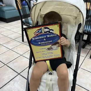 a child in a stroller