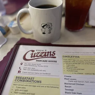  cup of coffee and a menu