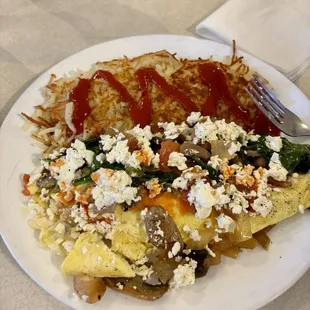 Garden fresh omelet with hash browns!