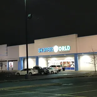 the front of a store at night