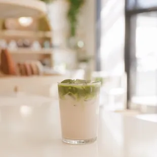 a cup of coffee on a counter