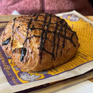 a baked pastry on a napkin