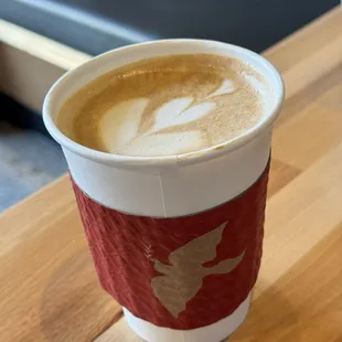 a cup of coffee on a table