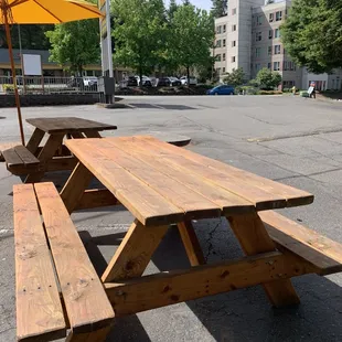 Outside bench seating and plenty of parking in the lot