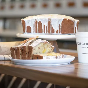 a loaf of cake and a cup of coffee