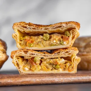 a close up of a pastry with a bite taken out of it