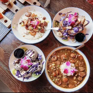 Gumbo (chicken, sausage, ham hock, shrimp) ube waffles, shrimp n&apos; grits, waffles