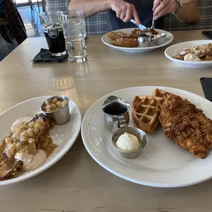 Apple French toast and CHICKEN &amp; WAFFLES, both split in half