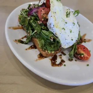 Avocado toast with over easy egg