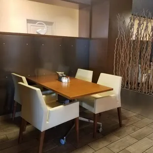 a table and chairs in a restaurant