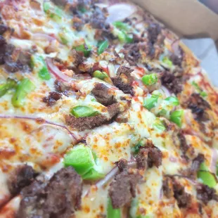 Cheese steak pizza