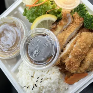 a meal in a styrofoam container