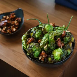 a bowl of brussels sprouts and nuts