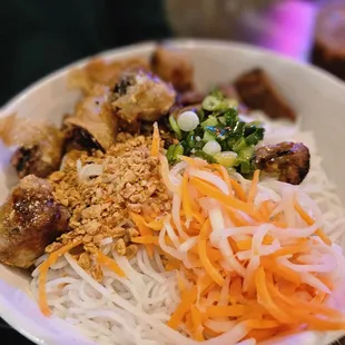 a bowl of noodles and meat