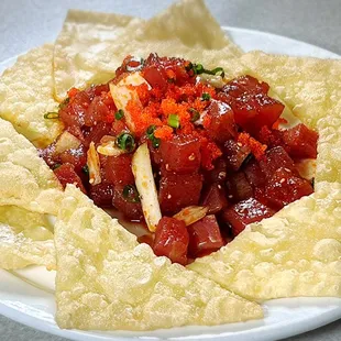 Spicy ahi nachos. 

Sichuan spicy style without mayo marinated Ahi with wonton chips.