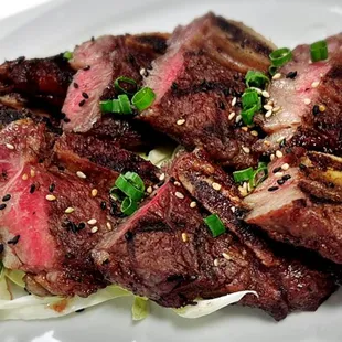 Pulehu Style Short Ribs. 

12oz 1/2 cut short ribs, dry style house marinated. Ono