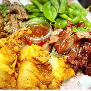 Platter for 2-3. 

Shimmered brisket, fried wonton, edamame and Charsiu.