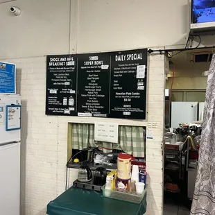 menus on the wall of a restaurant
