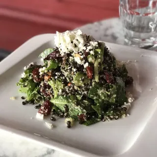 black lentil, bulgur salad with raisins, tart cherries, feta, almonds, mint