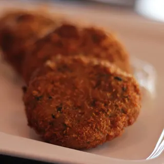 zucchini fritters with parsley, mint, feta cheese & yogurt sauce