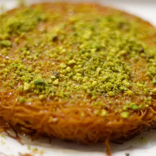 kunefe; baked shredded dough , house made fromage blanc, grapefruit, pistachios