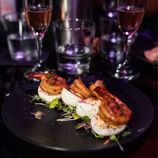 deviled eggs topped with grilled shrimp
