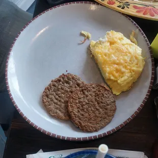 Scrambled eggs and sausage patties