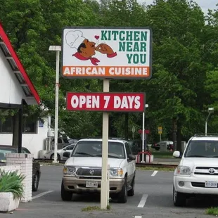 the signboard in front of the restaurant (note the announcement of "African Cuisine")