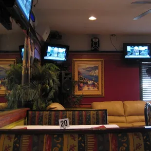 a slightly wider shot (note the TVs on the walls)