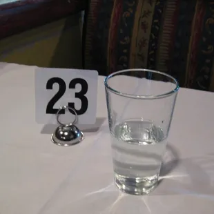 a glass of water (and my table number)