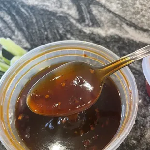  a spoon full of sauce