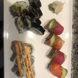 Shrimp tempura, rainbow roll, California roll with spicy mayo