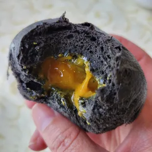 Inside black sesame salted egg yolk bun