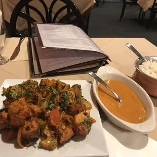 Mixed grill: lamb chicken salmon (nixed the shrimp), sauce and basmati rice