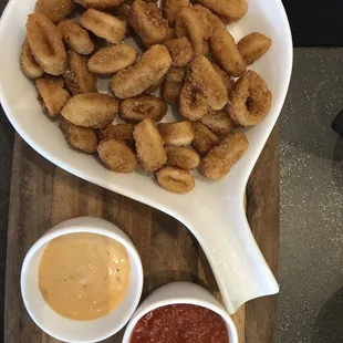 Calamari Appetizer with sweet marinara and sriracha ranch.