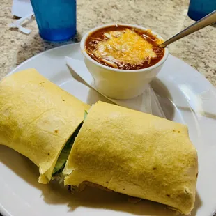 Chicken wrap with blackened chicken with a cup of chili ($11.49 as of 7/11/23) which was great.