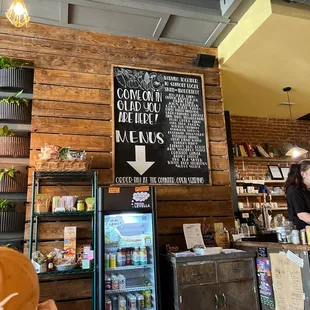 a woman standing at the counter