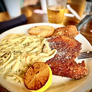 Pork Milanese with Fettuccine Alfredo and Texas Toast.