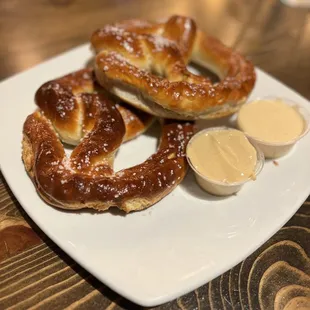 Pretzel with beer, cheese, and mustard
