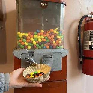 Peanut m&amp;ms for only 5 cents, delivers more m&amp;ms than the modern day candy machines. Lovely, nostalgic touch to the shop :)