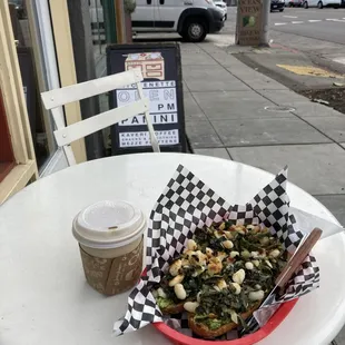 I had the best seat to watch the world go by while eating the best avocado toast I've ever tasted.