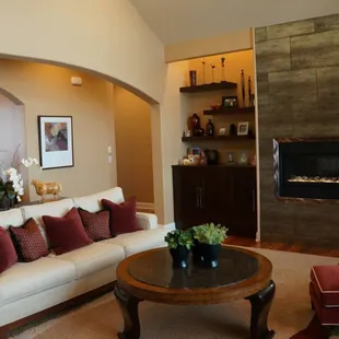 a living room with a fireplace