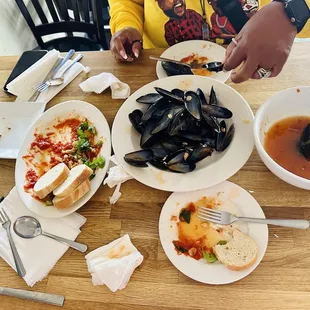 a table full of plates of food