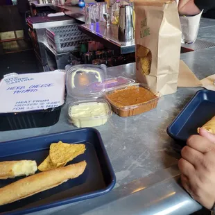 Taquitos-herb cheese potato, crema, salsa and chips.