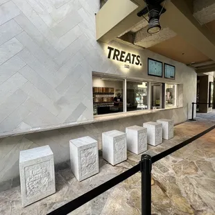 Marble stone seats with cereal brands engraved